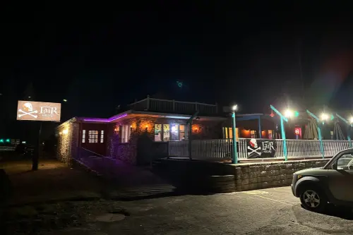 Night exterior shot of Thee Lair restaurant